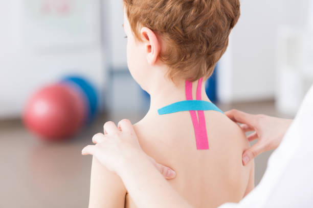 istock Pediatric physiotherapy and kinesiotaping 600102870