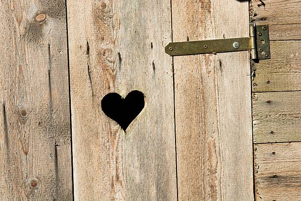istock Heart in wooden wall 600133436