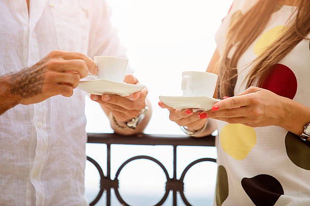 istock Young couple having coffee at the terrace 600135330