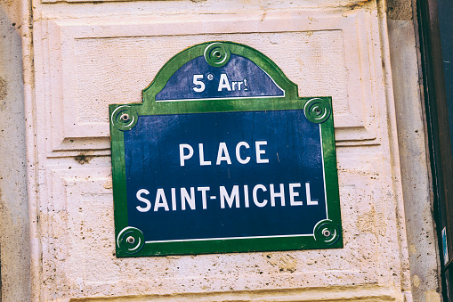 The street sign of Place Saint-Michel, Paris, France