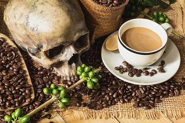 istock still life photography, coffee beans with skull 600137378