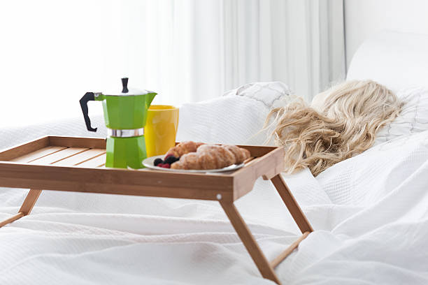istock Breakfast tray with coffee and croissant 600138038