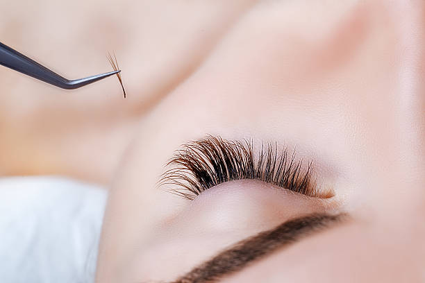 istock Woman Eye with Long Eyelashes. Eyelash Extension. Lashes, close up, 600140002