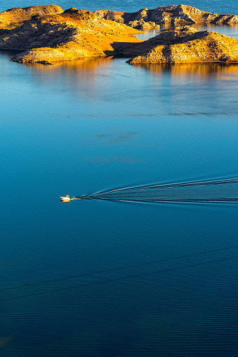 Fishing Boat with rising sunlight