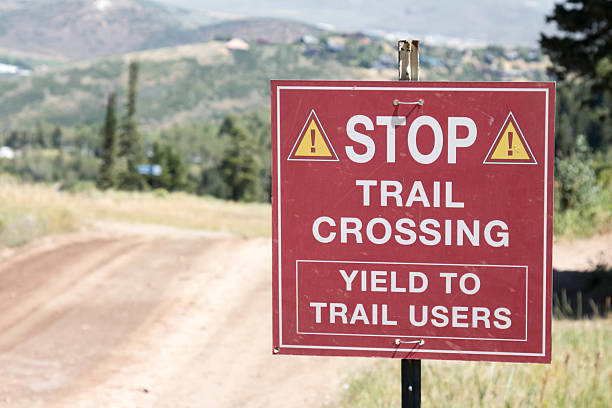 istock Stop trail crossing sign on a dirt road 600141342