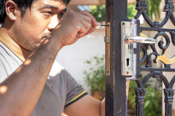 istock locksmith man whoe repair the door 600142130