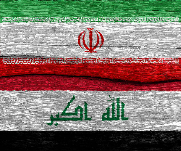 istock Iran and Iraq flag on wood texture background floor 600145892