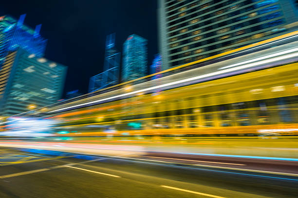 istock traffic through hong kong at night 600147604