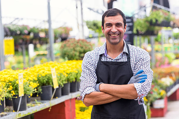 istock Male Florist working at a nursery 600147656
