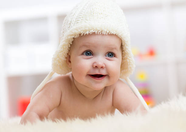 istock Cute little baby wearing a white hat 600149870