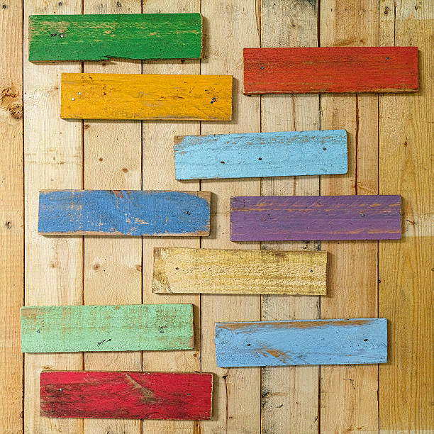 istock Old colourful weathered wood signs. 600150432