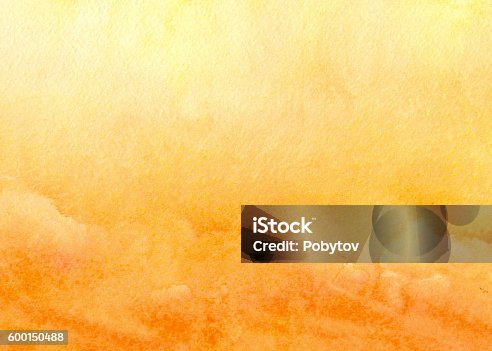 istock orange yellow watercolor background 600150488