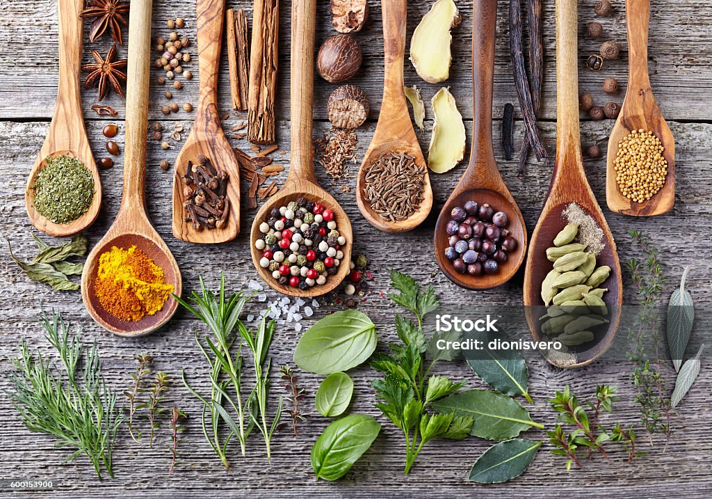 Herbs and spices Herbs and spices on a wooden board Herb Stock Photo