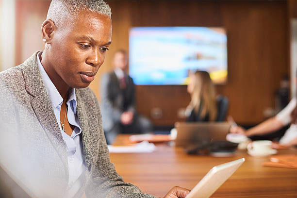 istock senior businesswoman on digital tablet 600154430