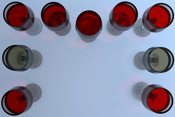 istock nine wine glasses: seven are filled with red wine 600154476