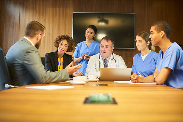 istock business and medicine working together 600155274