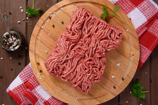 istock Minced meat on cutting board, top view 600156938