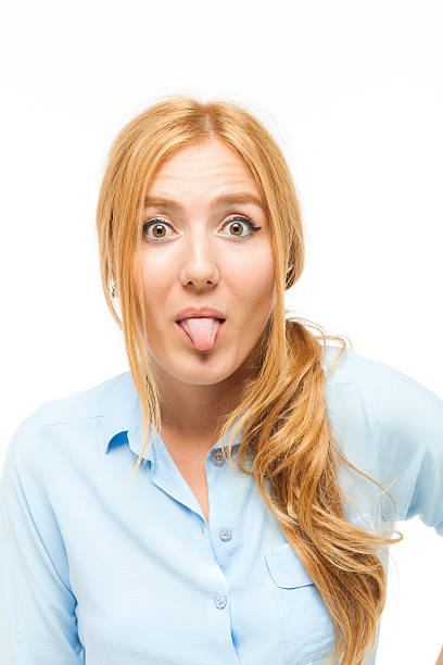 istock Girl with tongue stuck out 600159934