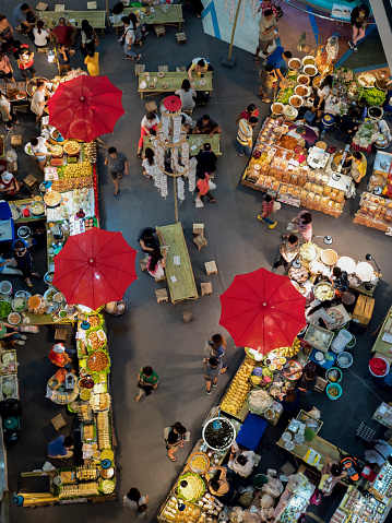view of fresh fruit and vegetables market covered with umbrella in chiangmai , thailand.
