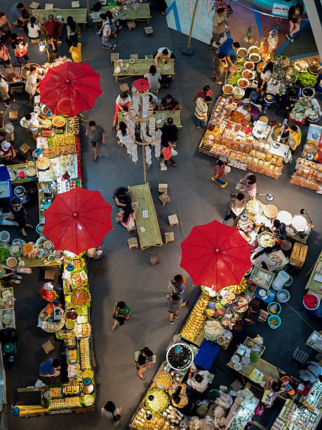 view of fresh fruit and vegetables market view of fresh fruit and vegetables market covered with umbrella in chiangmai , thailand. chiang mai province stock pictures, royalty-free photos & images