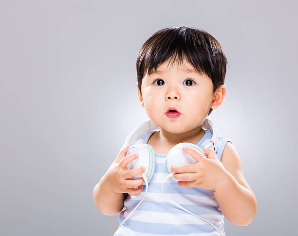 Chinese toddler with headphones