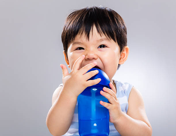 istock Chinese toddler having a drink 600167774