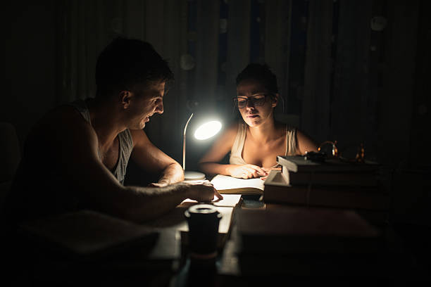 istock Couple studying in the dark 600173082