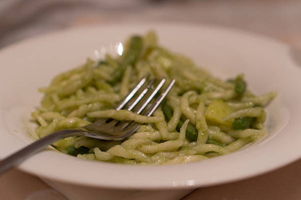istock Italian trenette pasta with pesto sauce, potatoes and string beans 600176614