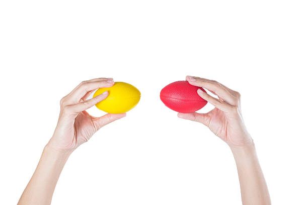 istock Hands of a woman squeezing a stress balls 600372986
