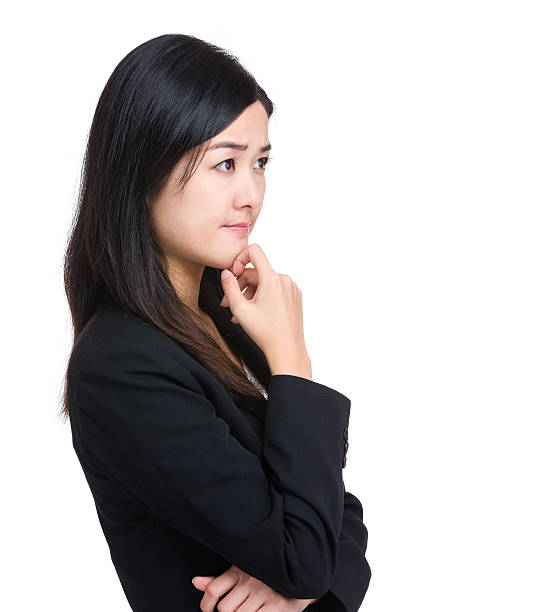 istock Chinese businesswoman thinking 600374996