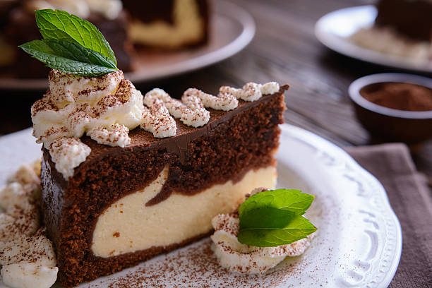 istock Piece of chocolate cheesecake with whipped cream 600378620