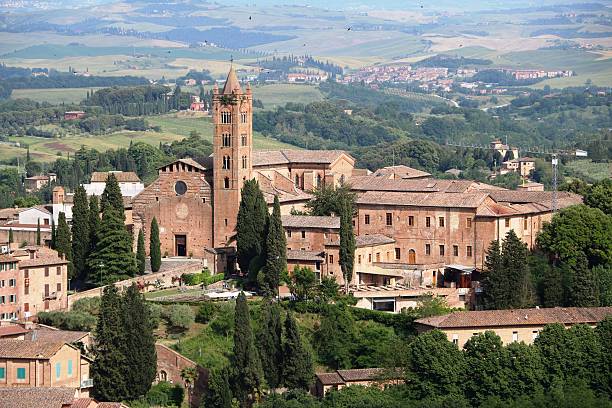Church in Siena view from Museo dell'Opera Metropolitana, Tuscany Italy Church in Siena view from Museo dell'Opera Metropolitana, Tuscany Italy derby city stock pictures, royalty-free photos & images