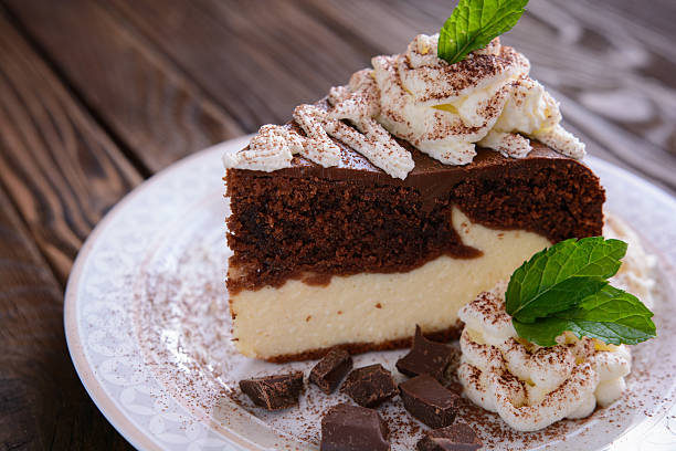 istock Piece of chocolate cheesecake with whipped cream 600378944