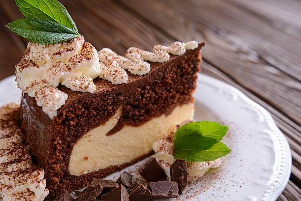 istock Piece of chocolate cheesecake with whipped cream 600379084