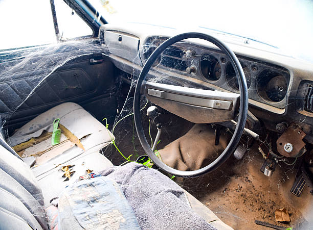 istock Driver's cockpit of a old car with spider web 600381586
