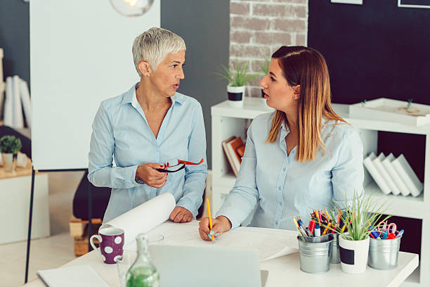 istock Two Businesswoman Brainstorming 600384578