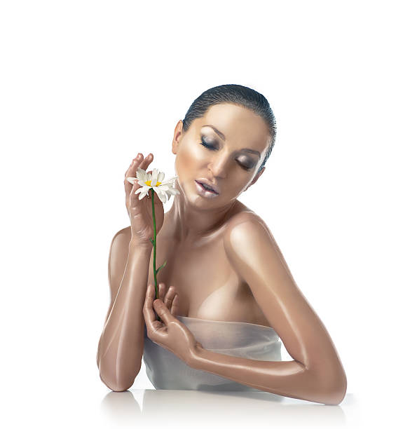 istock woman with perfect brown skin 600385462