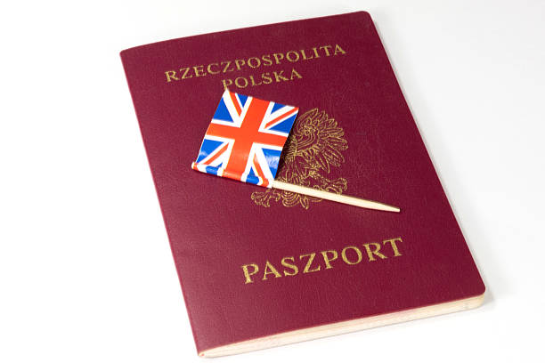 istock Polish passport and English flag 600388356