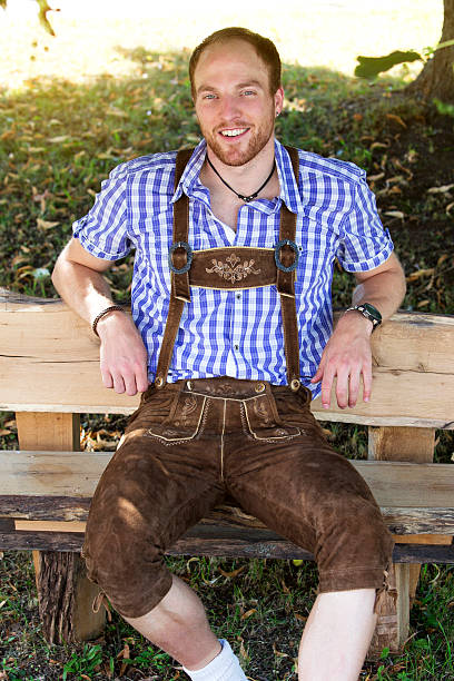 istock young man in traditional bavarian clothes 600390886