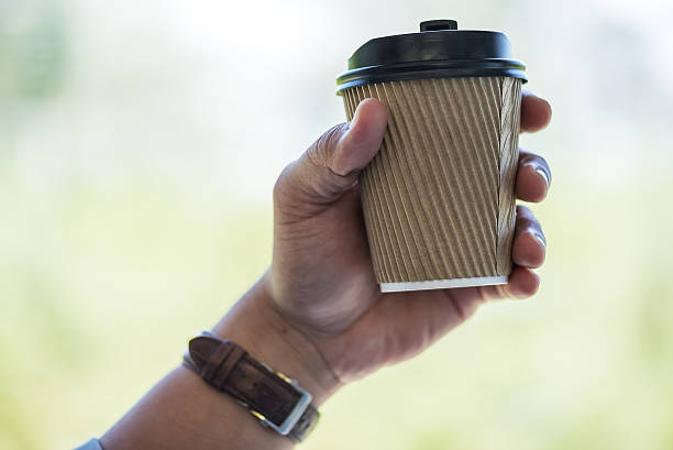 istock Cup of Coffee in hand 600391594