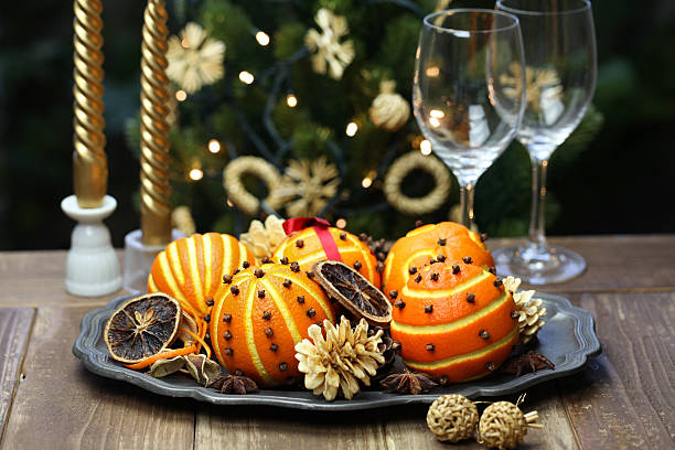 istock orange pomander balls, christmas table decoration 600392632