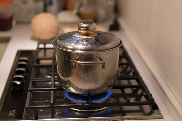 istock Stainless saucepan on a gas stove 600392828