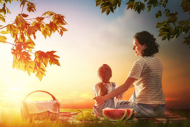 istock Family picnicking together 600392996