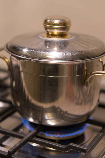 istock Stainless saucepan on a gas stove 600393076