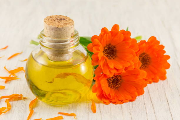 istock marigold oil with a fresh flower bouquet 600393890