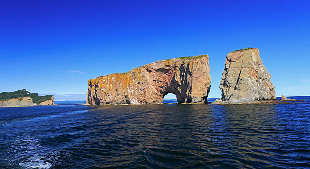 istock Perce Rock from the sea, Atlantic Ocean, Quebec, Canada 600395154