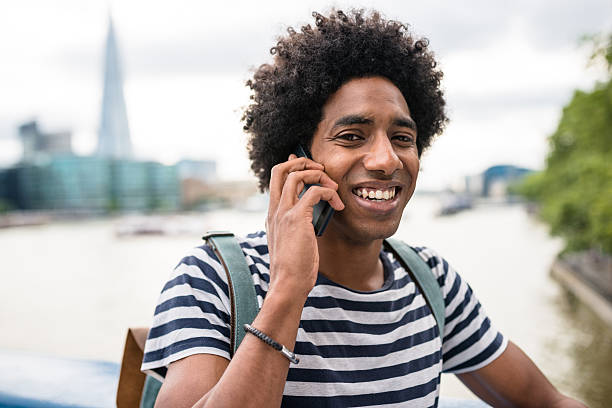 istock solo traveler in tower bridge area reading a map 600395366