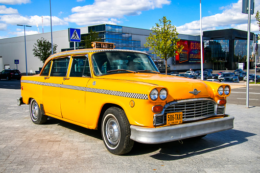 Moscow, Russia - September 1, 2016: Yellow Checker taxi of New York is parked in the city street.