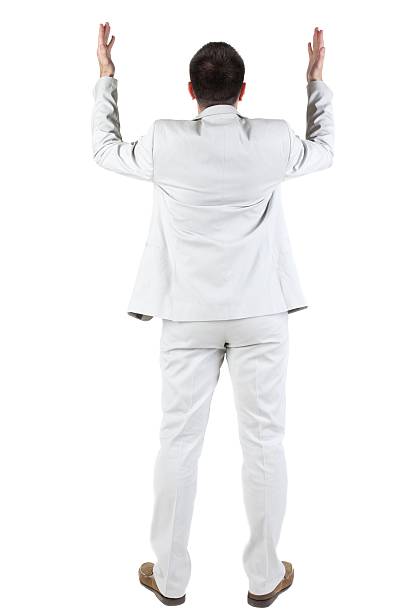 istock Back view of shocked and scared young business man. 600403134
