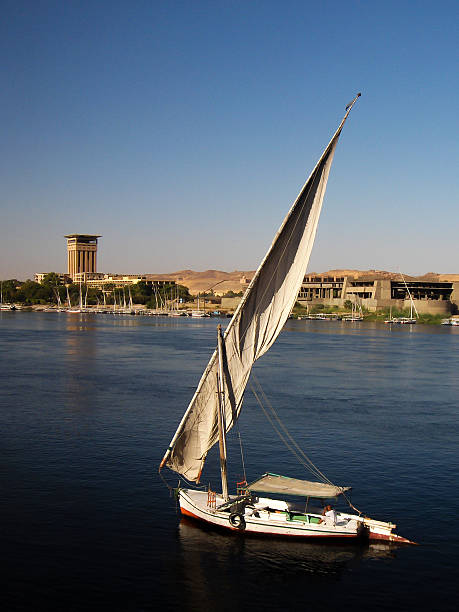 Feluca Boat on the Nile. Aswan, Egypt - September 26, 2006: Feluca Boat sailing on the Nile River. aga khan iv stock pictures, royalty-free photos & images